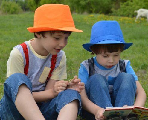 two kids speaking to each other