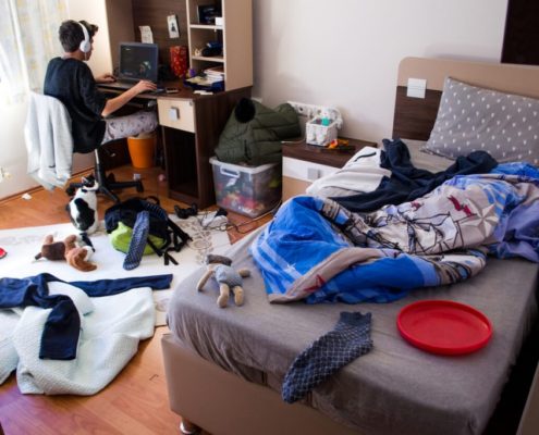 a teenager with a messy room