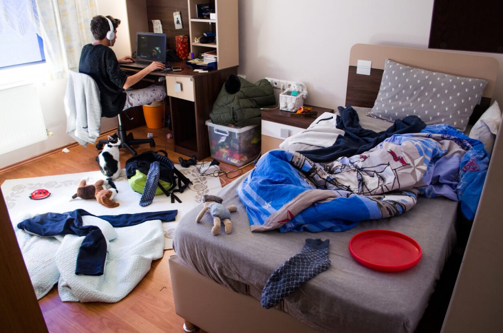 a teenager with a messy room