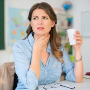 a woman with sore vocal nodules