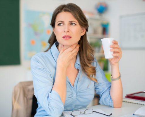 a woman with sore vocal nodules