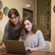 a mother helping a child that has ADHD