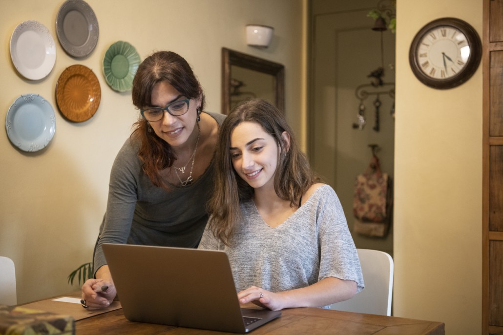 a mother helping a child that has ADHD