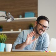 a man with TBI taking online speech therapy