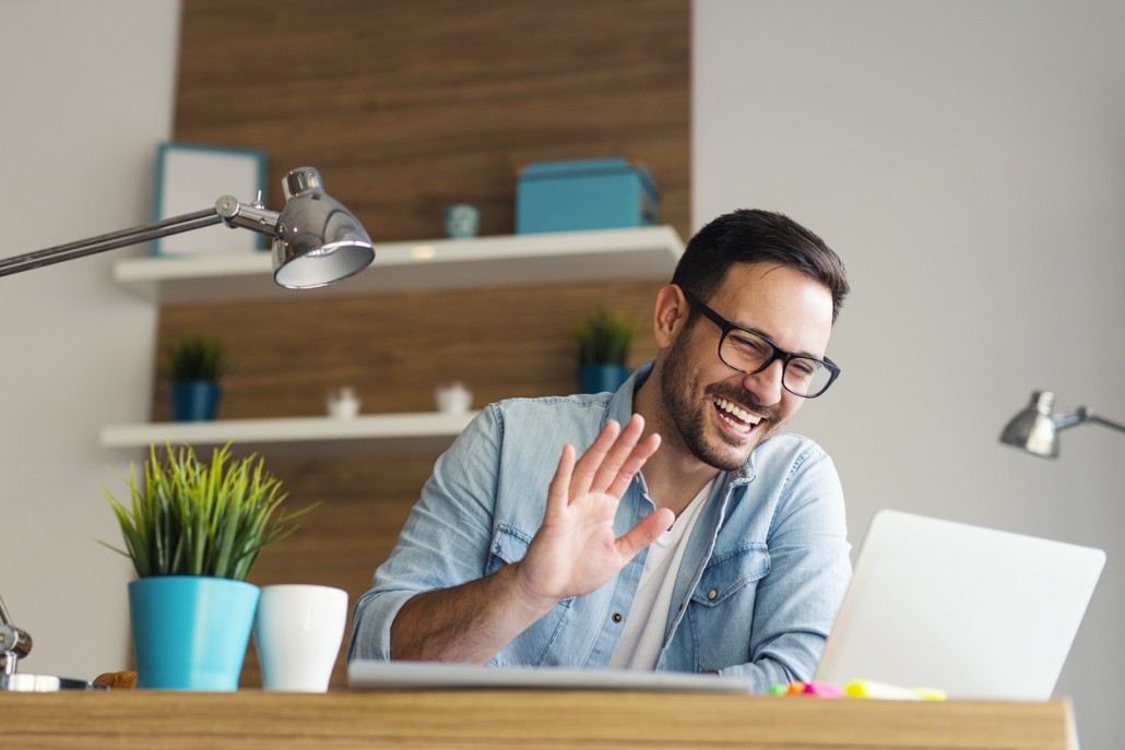 a man with TBI taking online speech therapy