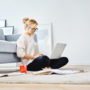 a woman with ADHD getting online speech therapy at home