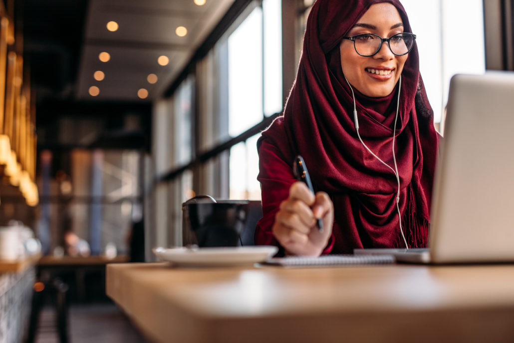 a woman taking an online class to reduce her accent