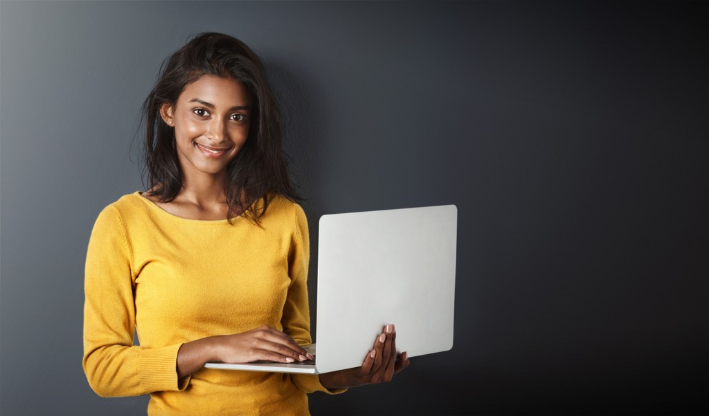 A girl searching online for a speech therapist