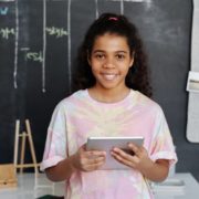 a child doing online speech therapy from home