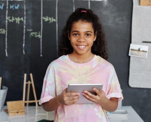 a child doing online speech therapy from home