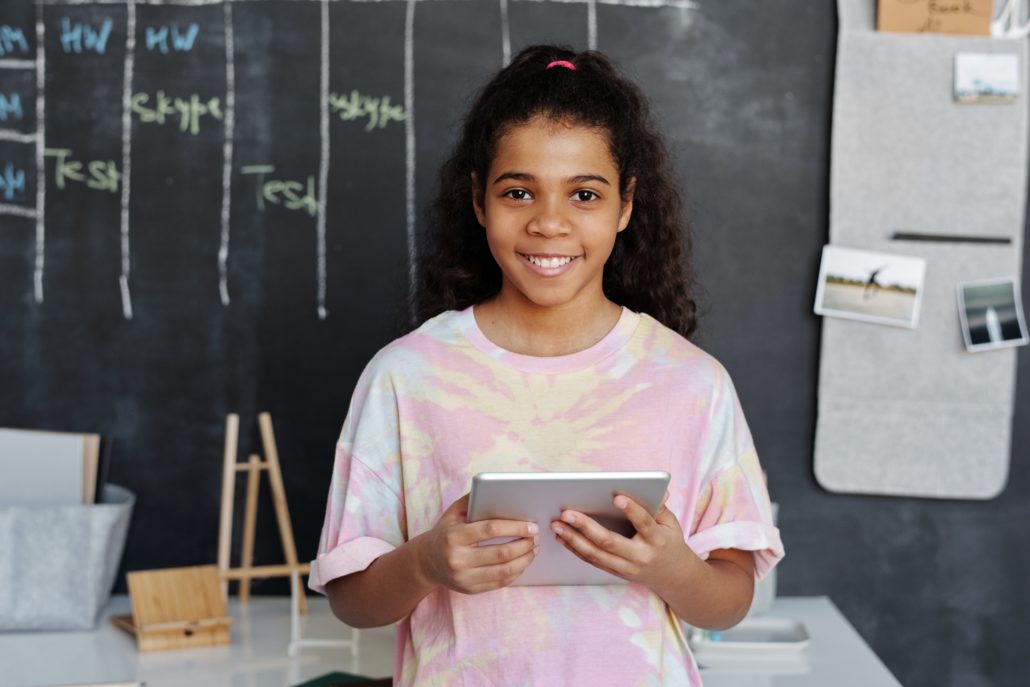 a child doing online speech therapy from home