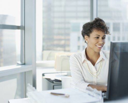 woman doing online speech therapy from her office