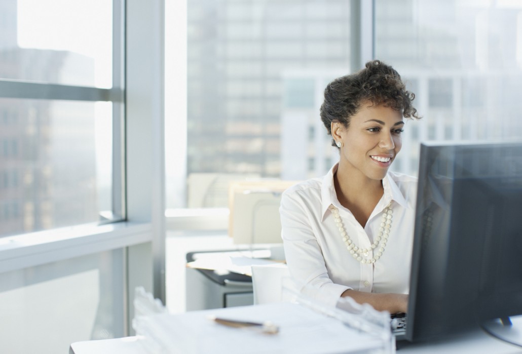 woman doing online speech therapy from her office