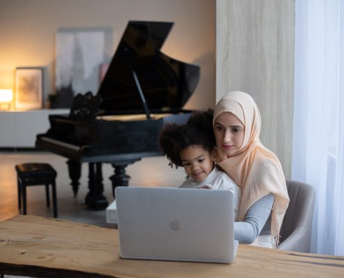 a mother and daughter on a screen together