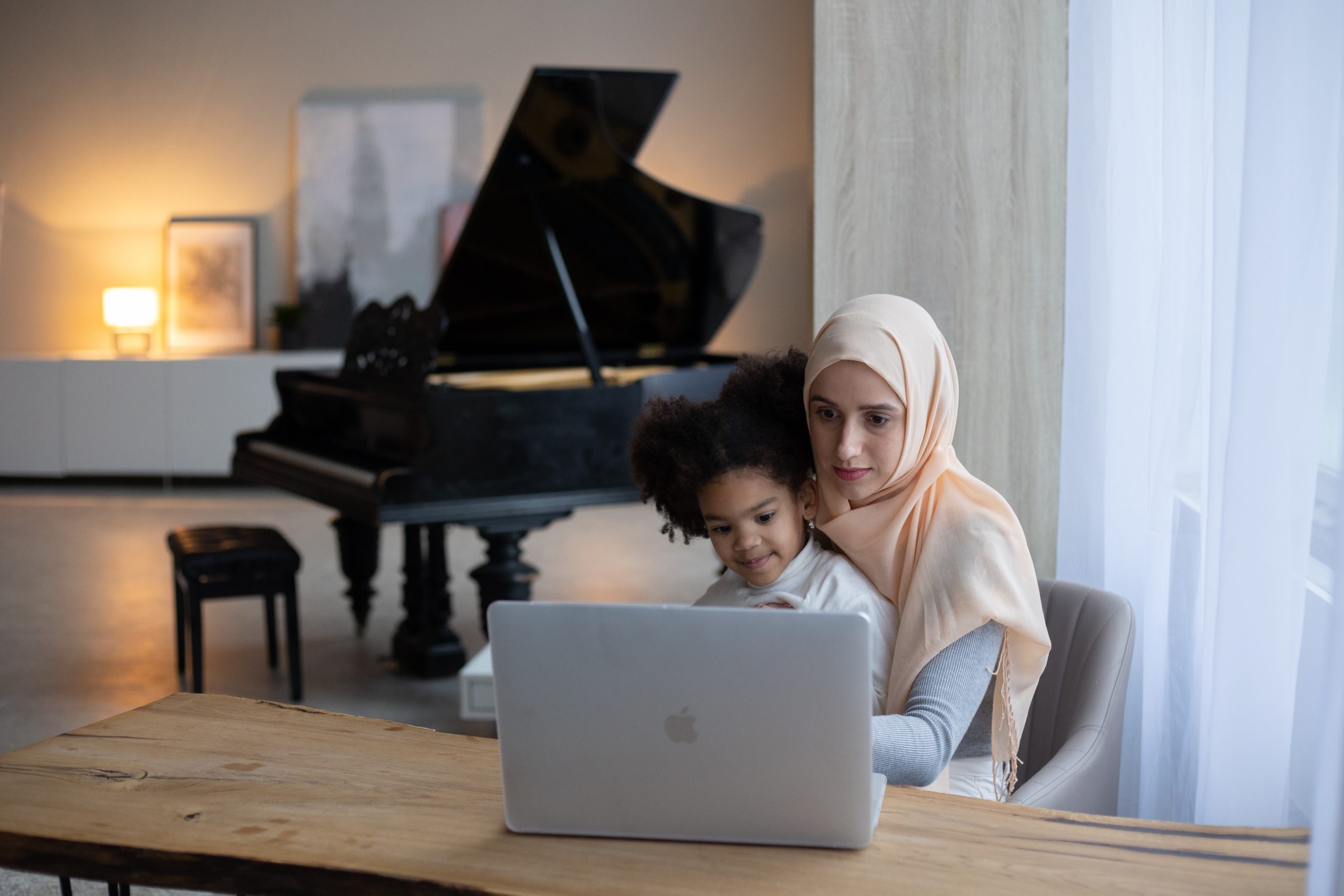 a mother and daughter on a screen together