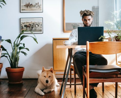 a man learning how to stop his stutter using his computer