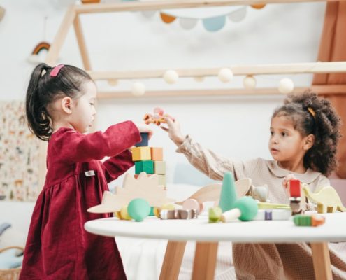 2 year old children playing with blocks