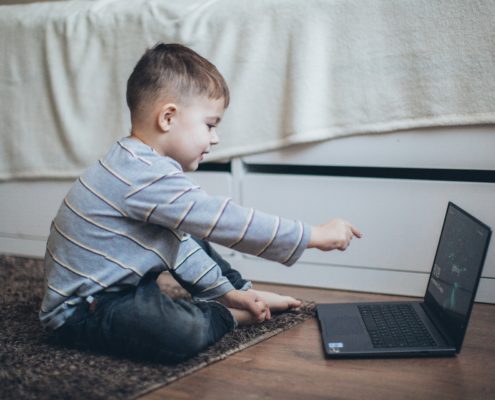 a child learning at a computer