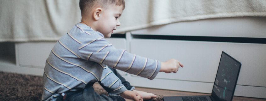 a child learning at a computer