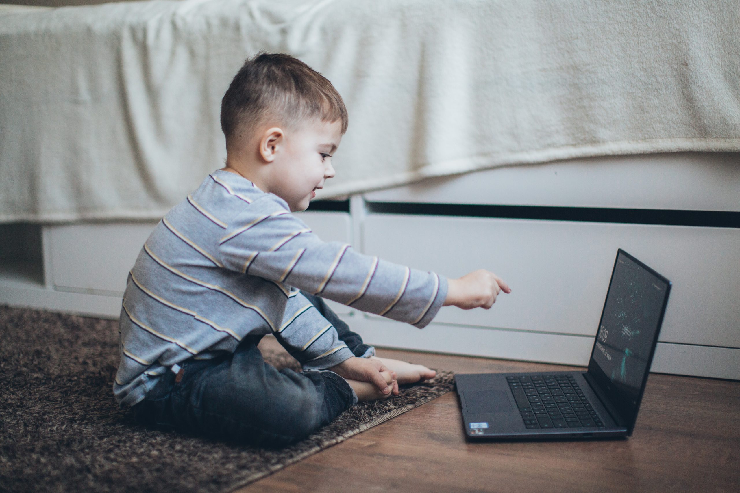 a child learning at a computer