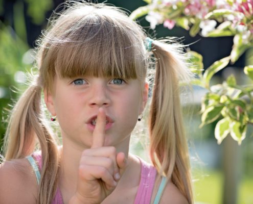 a child learning how to pronounce the shh sound