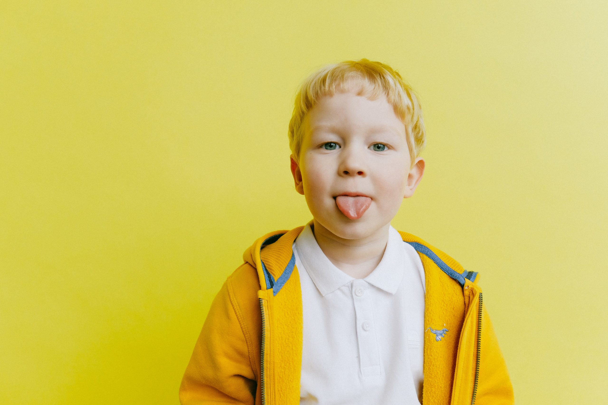 a child exercising their tongue to improve their speech