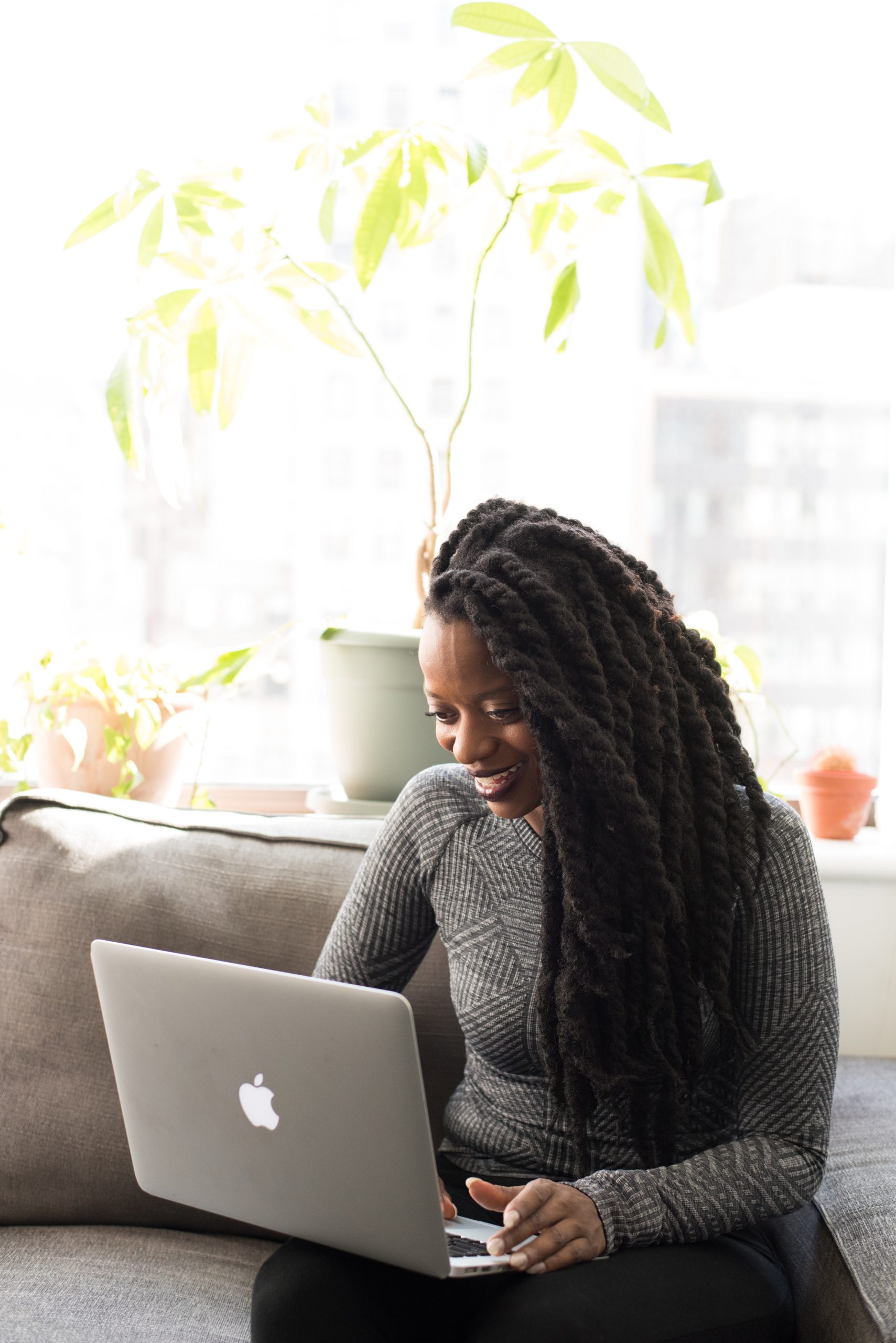 An adult doing online speech therapy at home