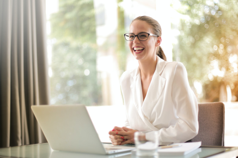 a woman with aphasia at home on a laptop