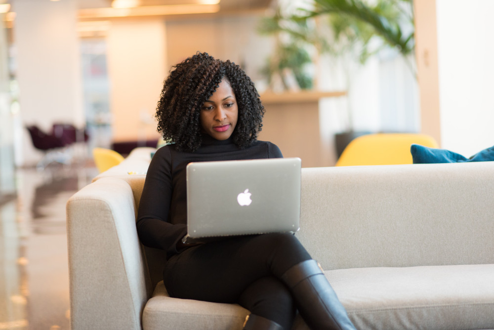 woman at home working on her language skills