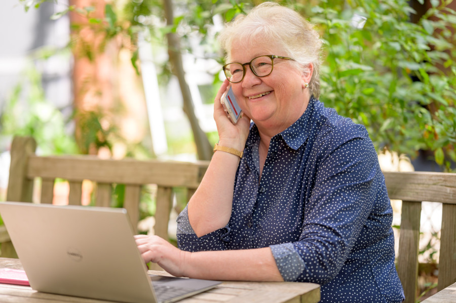 senior citizen at home learning about speech