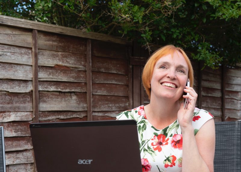 a woman learning from home on her laptop