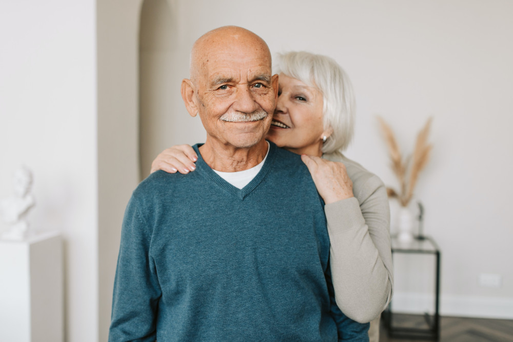 an older couple smiling