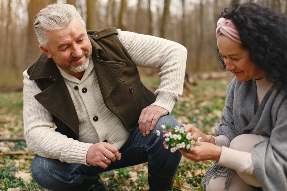 a couple in the forest enjoying nature and chatting