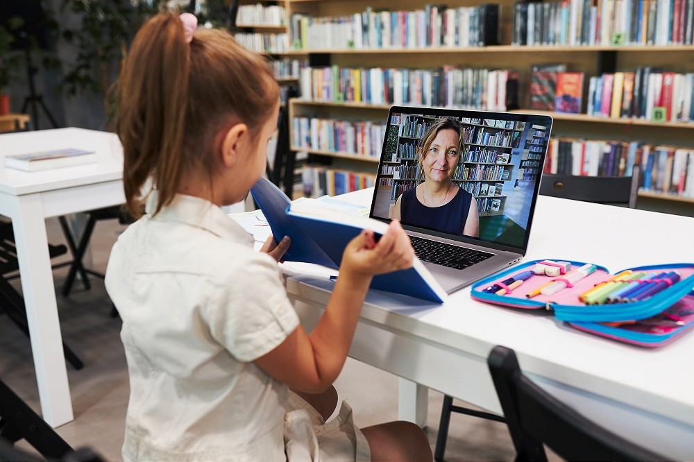 school child learning from a remote computer