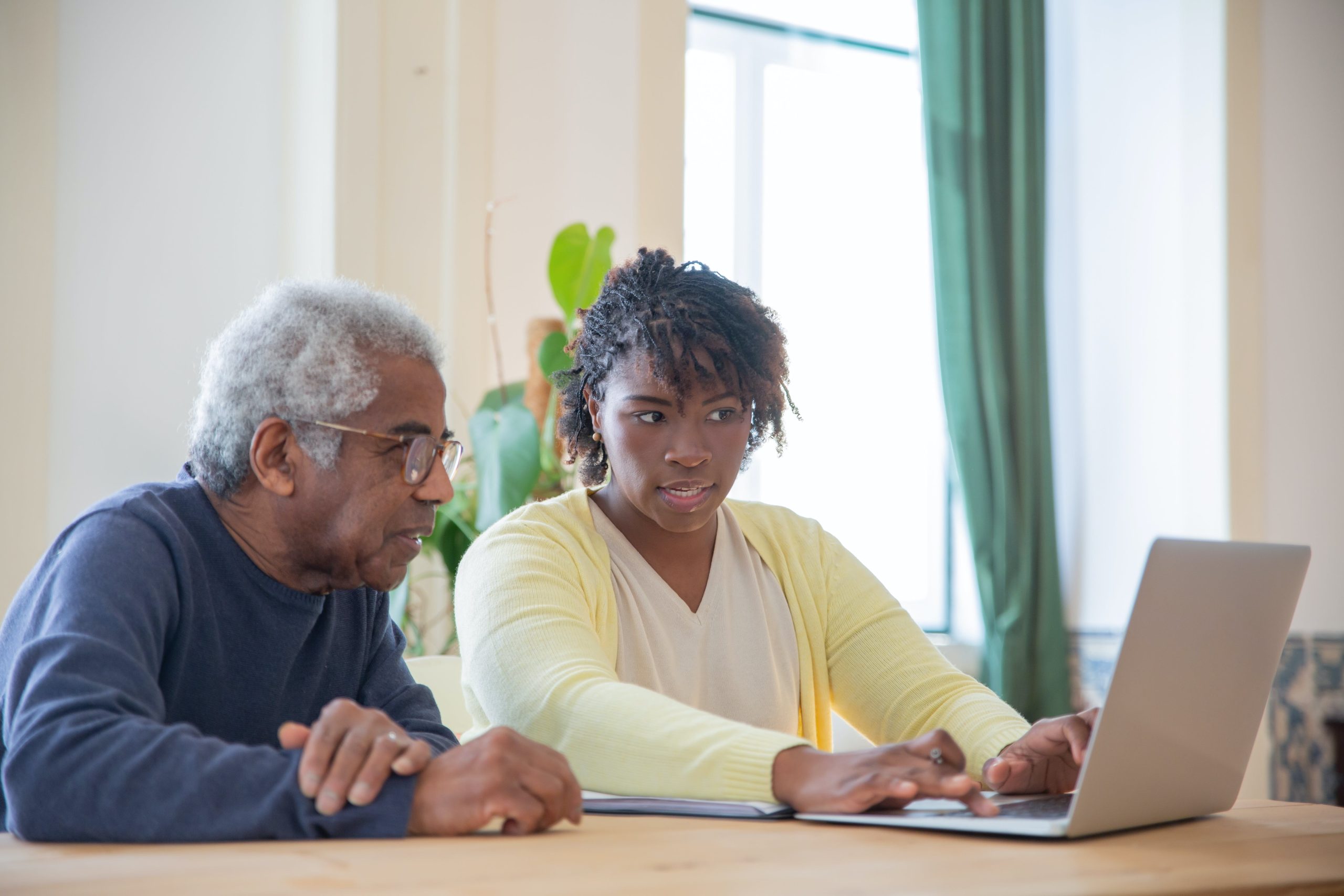 a woman at home doing online speech therapy