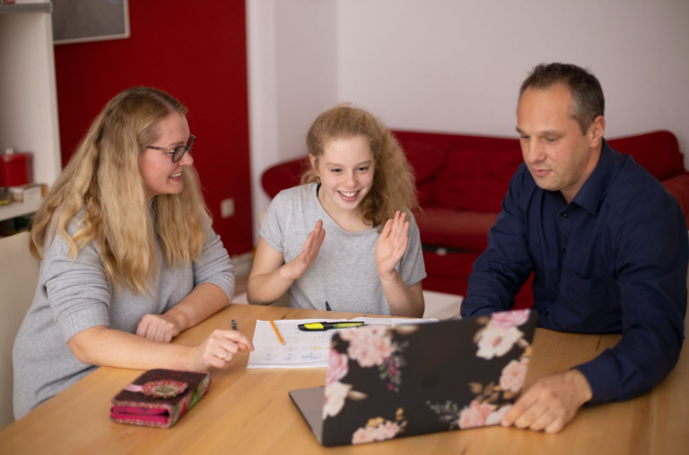 A girl at home doing speech therapy