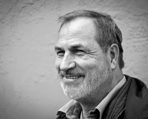 black and white picture of a man with a cochlear implant